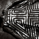 Illustration for article titled Daphne Guinness Channels David Bowie for Bryan Adams
